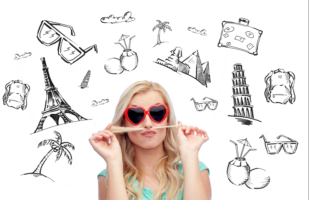 people, tourism, vacation and summer holidays concept - smiling young woman or teenage girl making mustache with strand of hair over touristic doodles