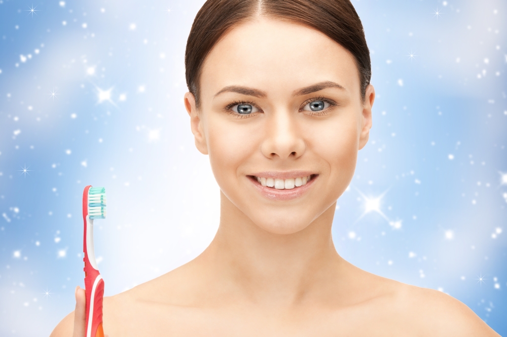 bright closeup portrait picture of beautiful woman with toothbrush