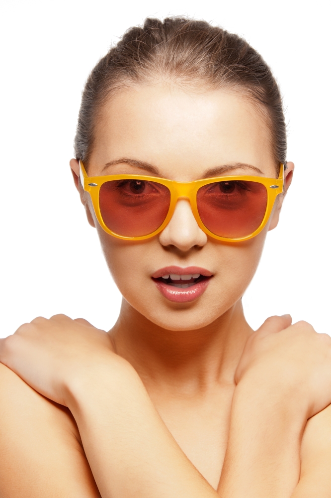 bright closeup portrait picture of teenage girl in shades
