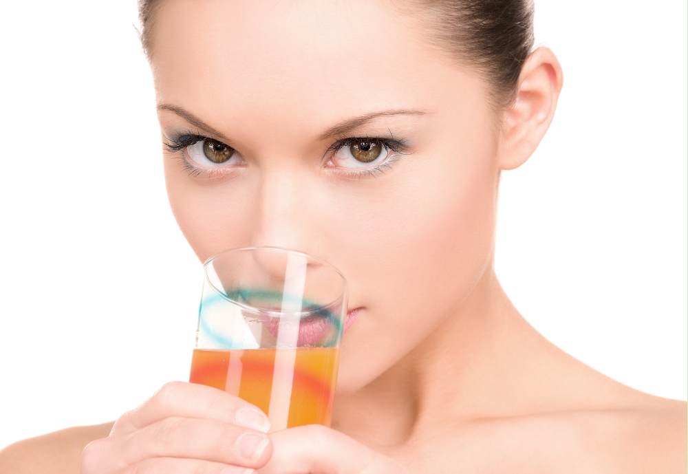 bright picture of lovely woman with glass of juice