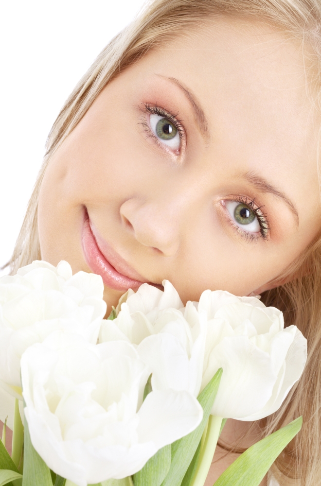 picture of happy blond with white tulips