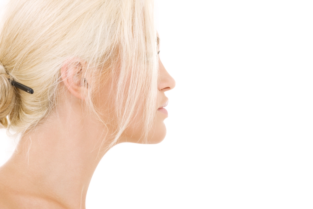 bright sideview picture of lovely blonde over white