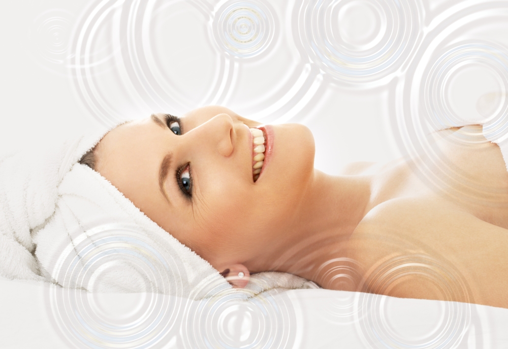 picture of happy lady in massage salon with waterdrops