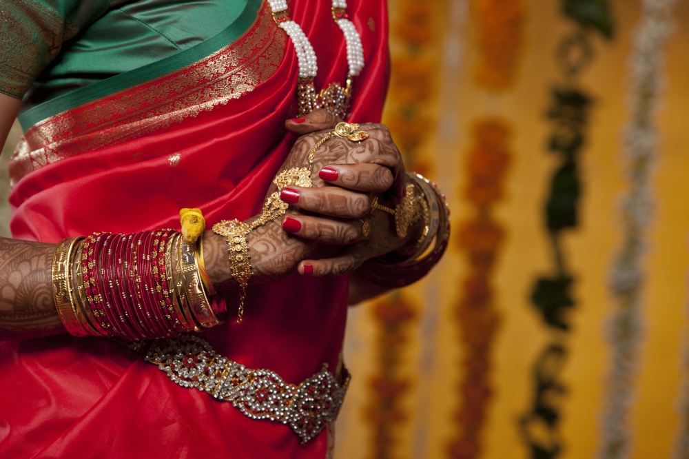 Close-up of bangles on a brides hand
