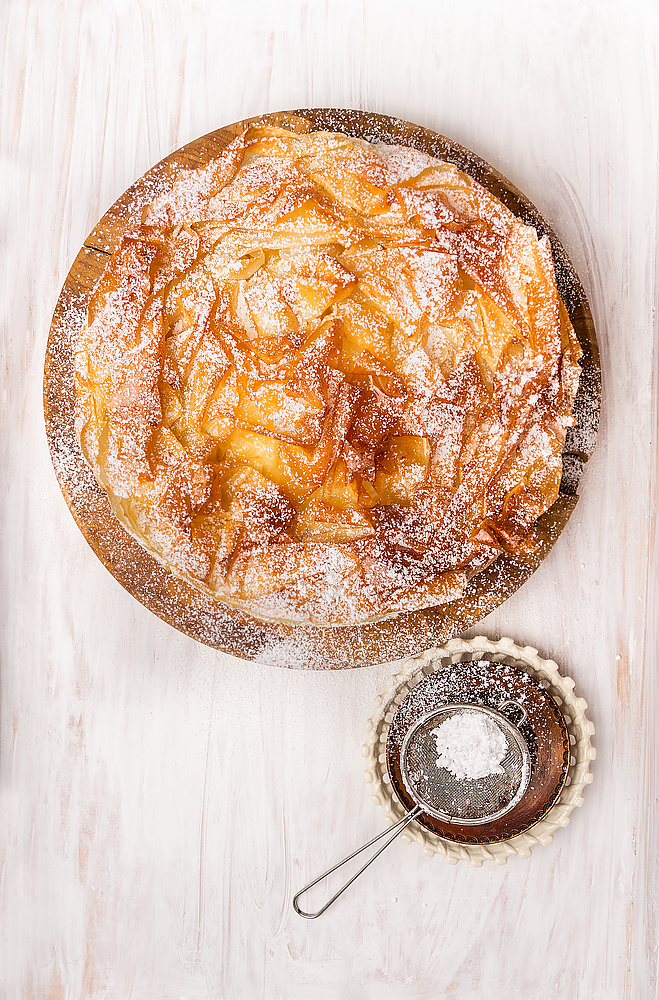 Sweet Filo pastry cake  and  Sifter Spoon, top view