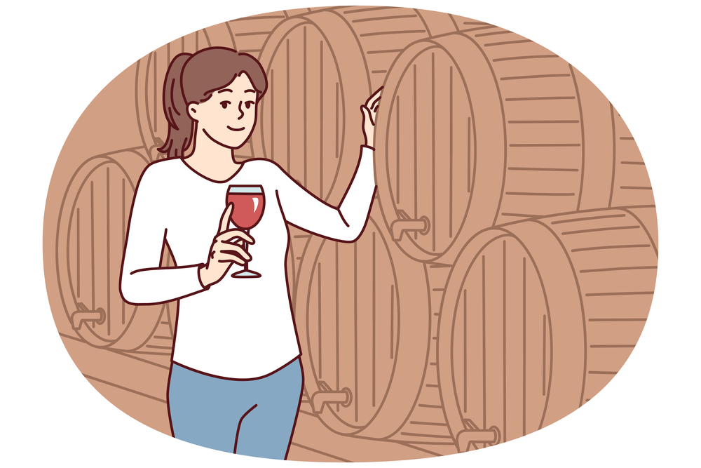 Woman with glass of wine stands near wooden barrel for tincture of alcoholic drink and looks at screen. Positive lady in casual clothes walking alone in winery cellar. Flat vector illustration. Woman with glass of wine stands near wooden barrel for tincture of alcoholic drink. Vector image