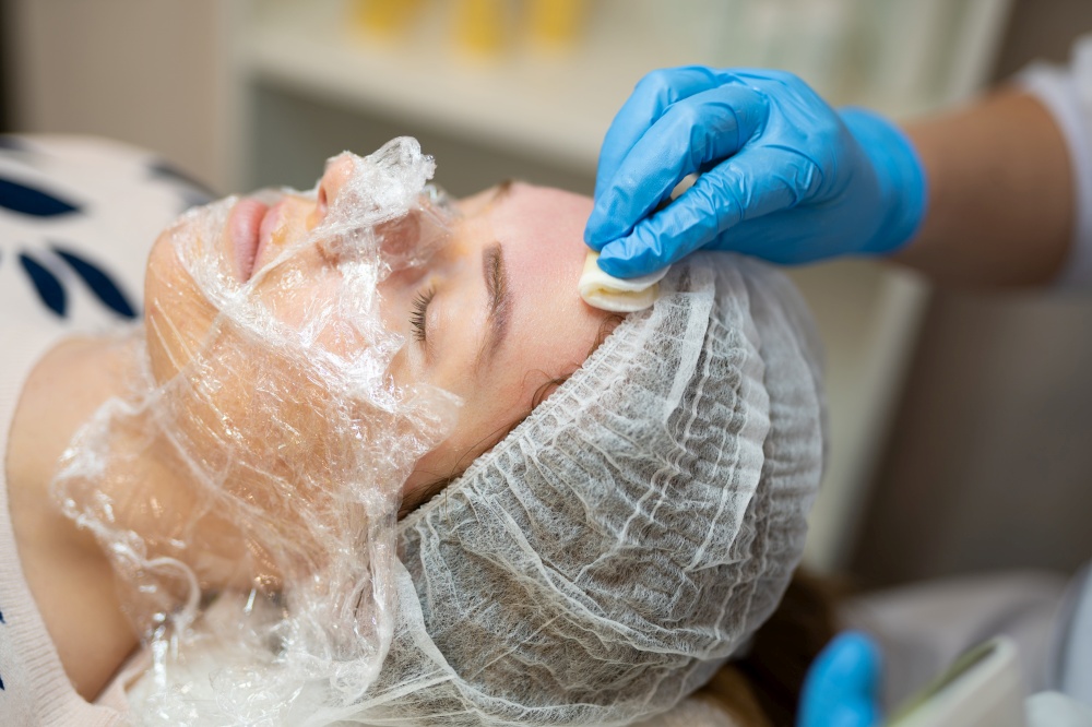 close-up of a girl&quot;s face at a cosmetologist during treatment procedures