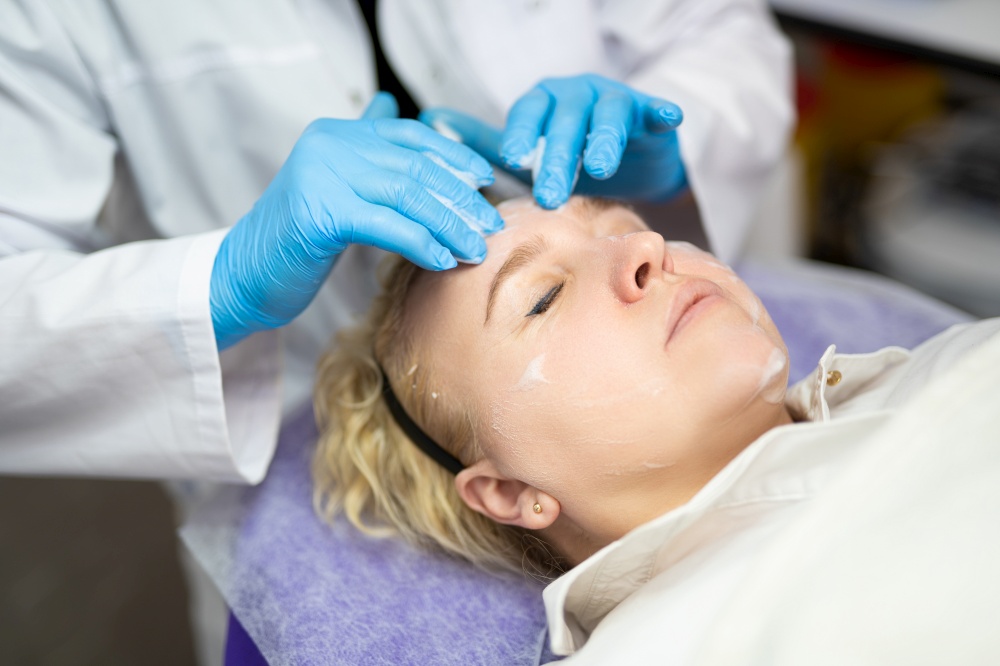 close-up of a girl&quot;s face at a cosmetologist during treatment procedures