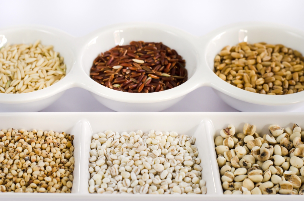 Grain and Cereal Set ,  rice , red rice , wheat,  job&rsquo;s tears , barley and millet grains on white bowl