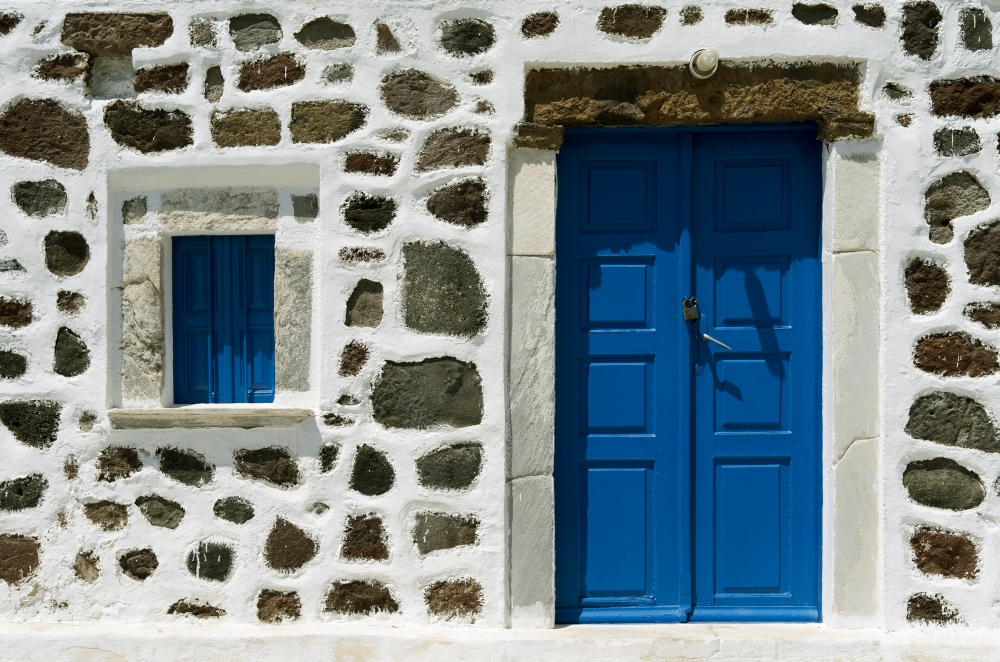 Door of a church in Red Beach on the island of Santorini in Greece.