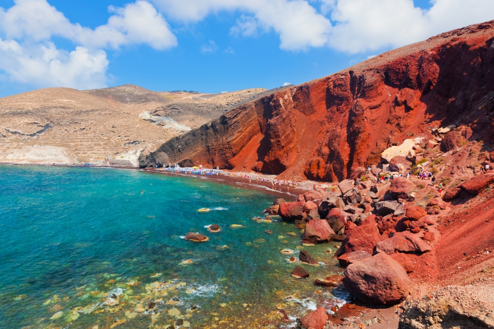 Red beach on Santorini island, Greece. Volcanic rocks on Aegean sea.
